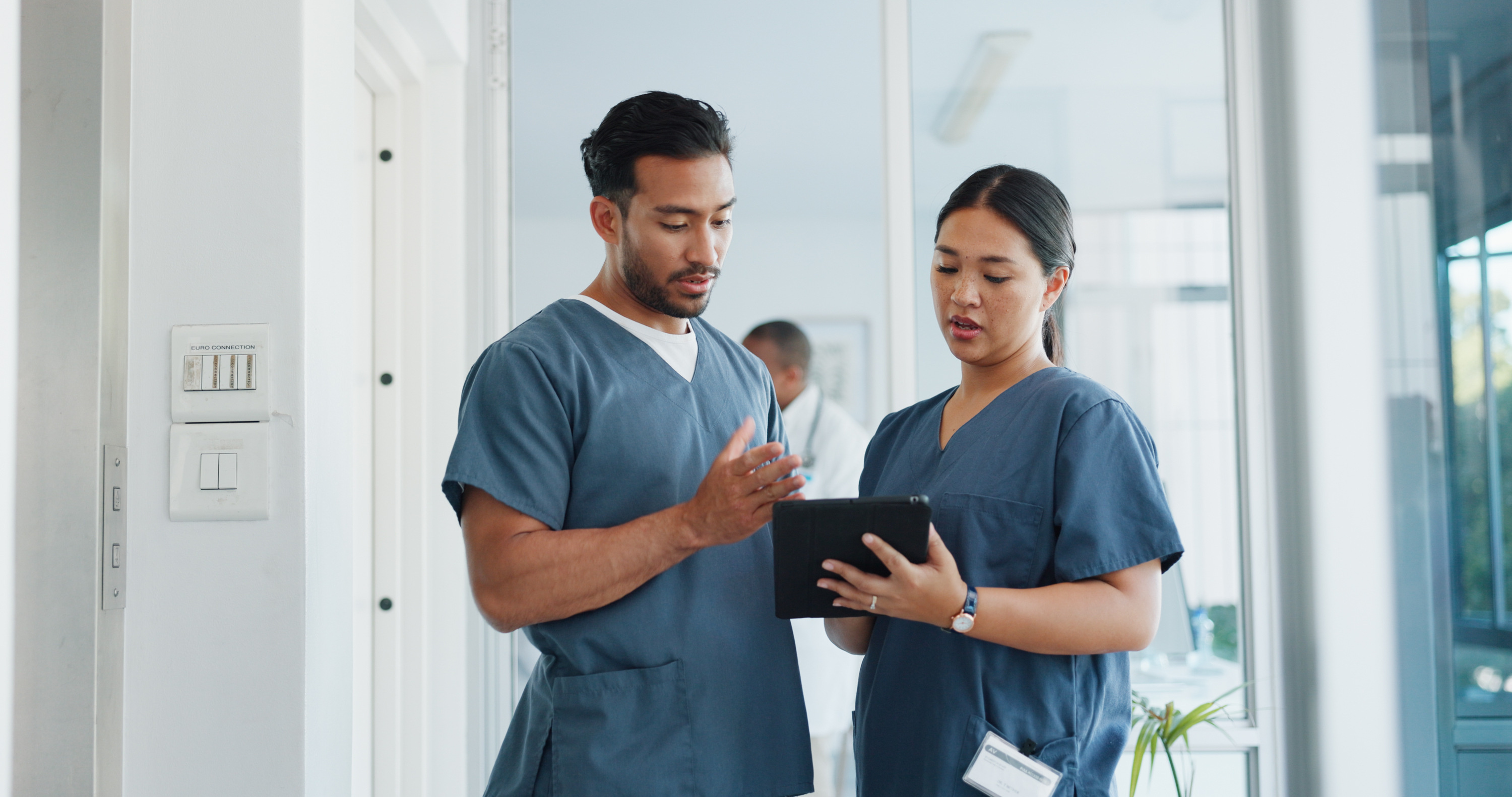 Medical Advice, Help And Doctors With A Tablet For Healthcare, Research And Medicine Planning. Communication, Collaboration And Men Working In Cardiology Talking About Surgery Results On Technology